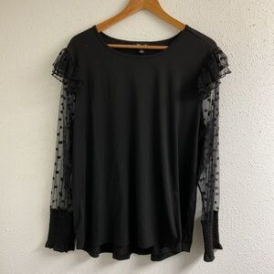 Elegant Black Top with Sheer Polka Dot Sleeves